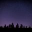 读者“观星者阿朴”的评论头像，夜色背景的人物剪影